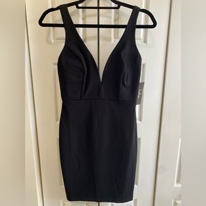 Lulus - little black bodycon dress. Deep V neck and low-back.